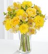
Such a happy bouquet -- it's practically begging to be shared! These bright yellow roses, Peruvian lilies and cushion poms are arranged in a glass cylinder vase, ready to bring sunny wishes into any h...
			